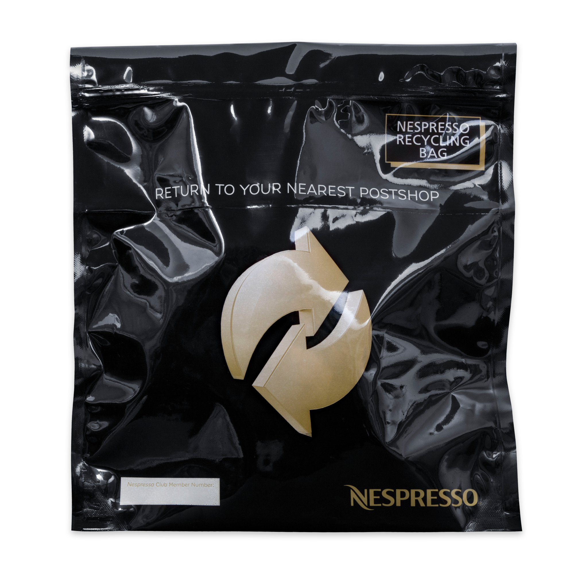A Nespresso recycling bag in use with used coffee capsule pods on a white  background for isolation Stock Photo  Alamy