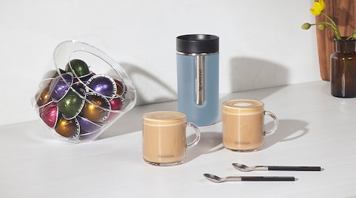 Travel mug comparison: Nomad medium, Touch and Nomad small bottle. Comments  below. : r/nespresso
