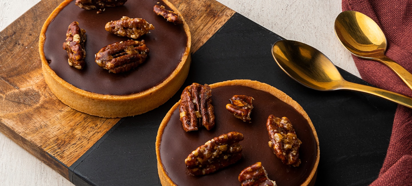 Recette de tarte étoile au chocolat noir et noix de pécan – L'Express